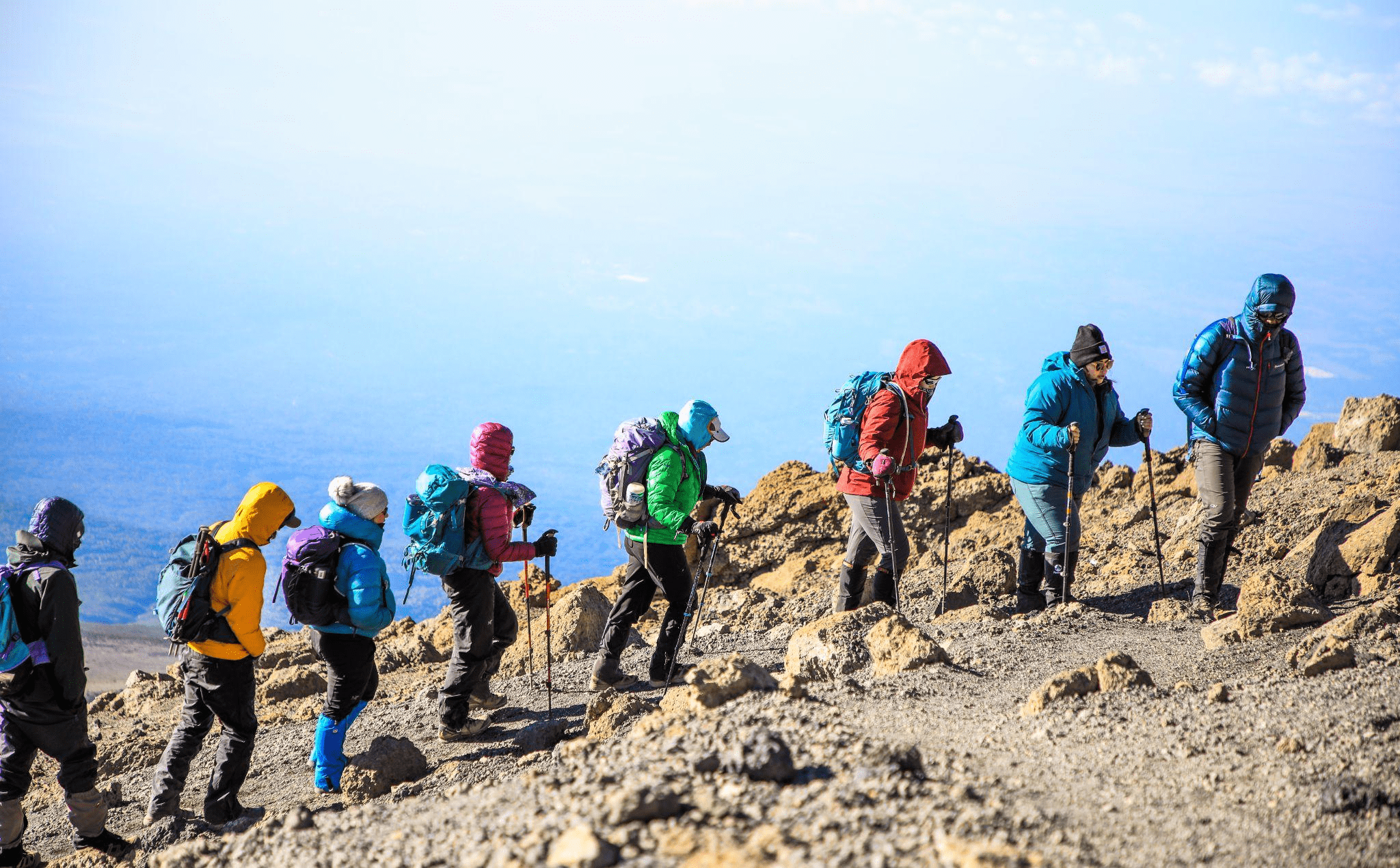 A group of people hiking on a mountain