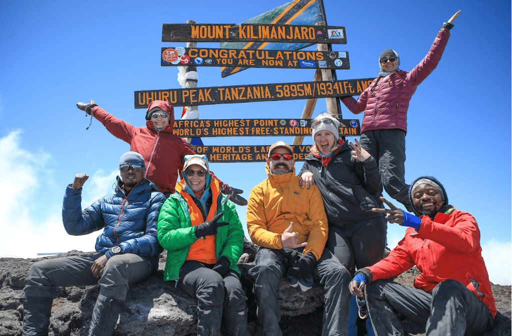 A group of hikers doing Mount Kilimanjaro Trekking Alt-Text: Mount Kilimanjaro Trekking
