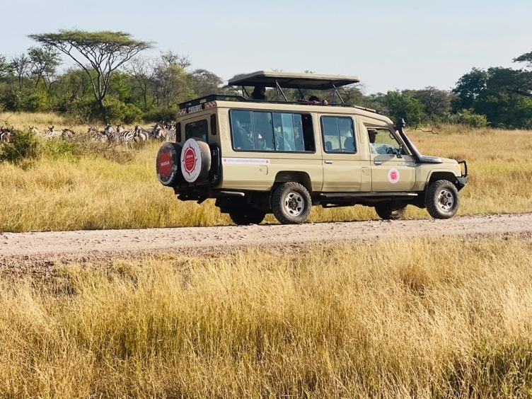Group of people in a safari jeep