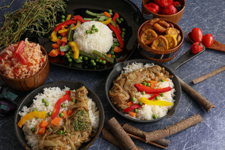 African rice dishes served with vegetables and spiced meats